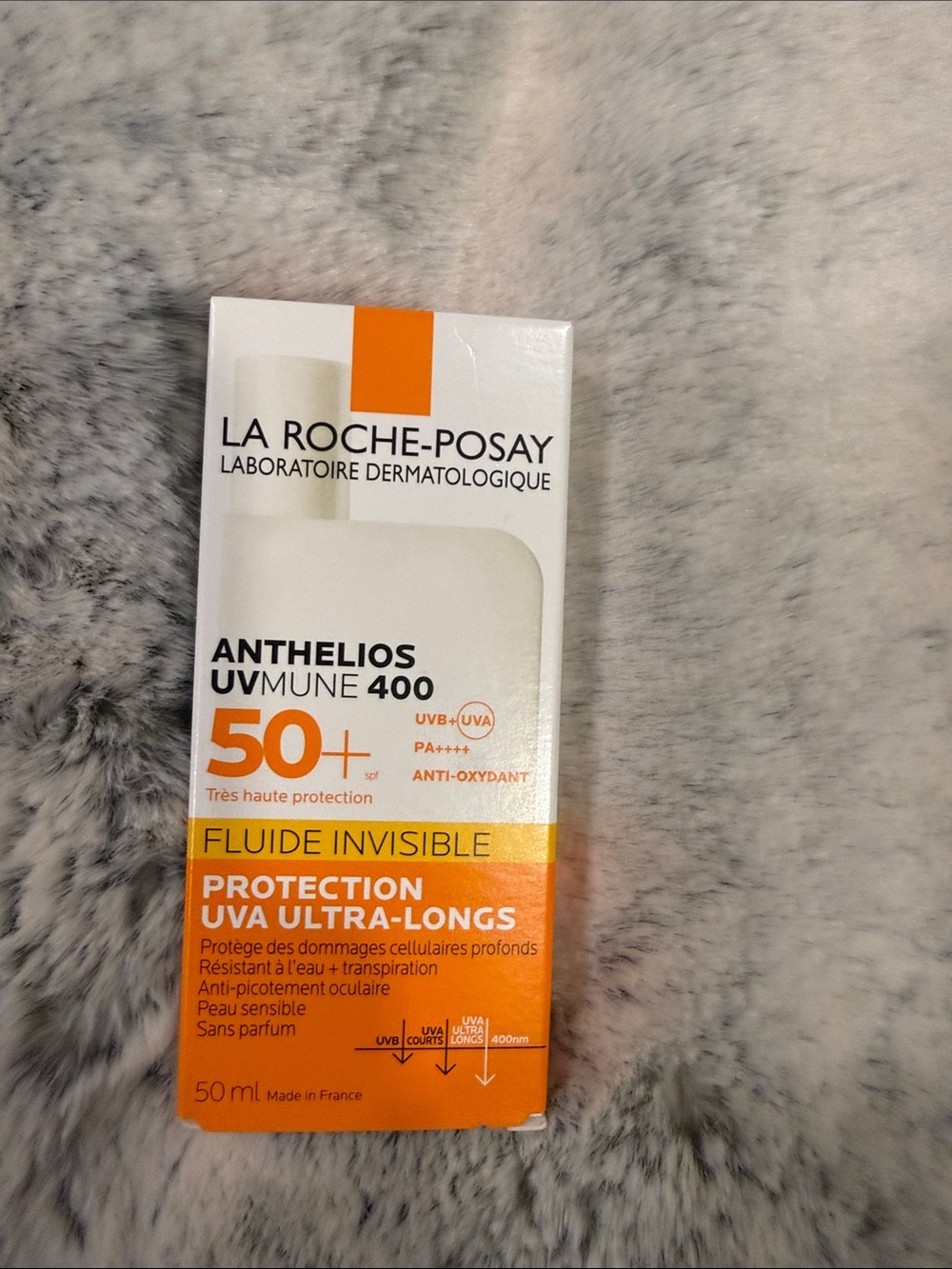 La Roche-Posay Anthelios UVMune 400 SPF 50+ Invisible Fluid - Orange/White